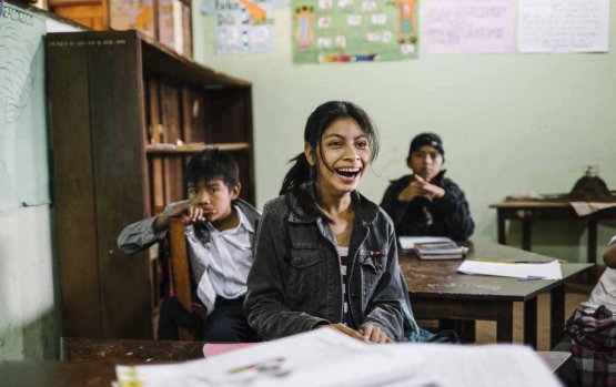 Girl in school laughing