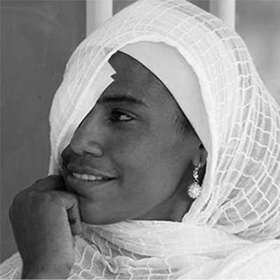 young lady with a bandage on right eye